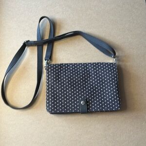 Thirty-One gray and white crossbody purse.  Neutral design with polkadots.